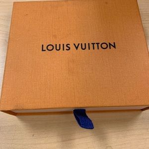 A Louis Vuitton Key Holder Wallet